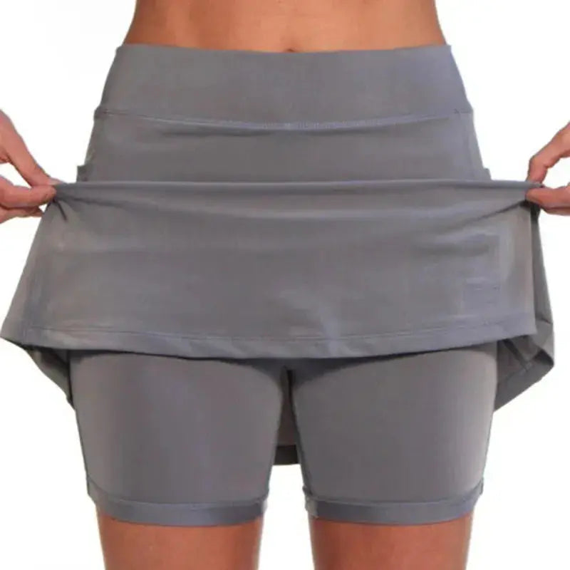 Femme - Jupe de sport respirante avec poches pour femme, courte, couleur unie, anti-exposition, pour la course, le tennis, le golf