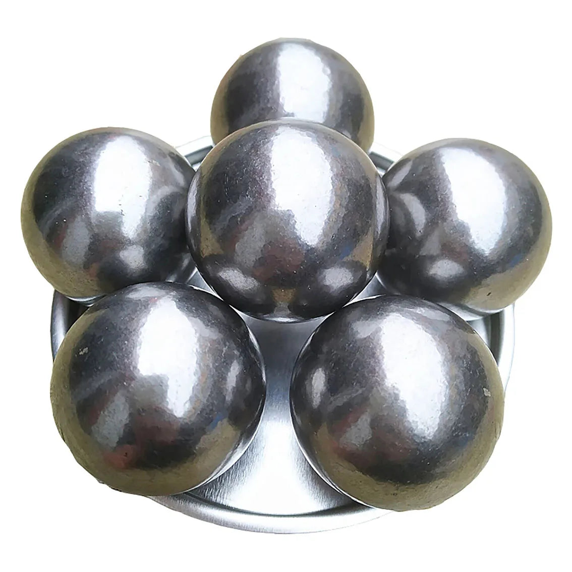 Six solid pétanque balls made of high-quality metal, arranged on a metal plate, showcasing their excellent craftsmanship and durability.