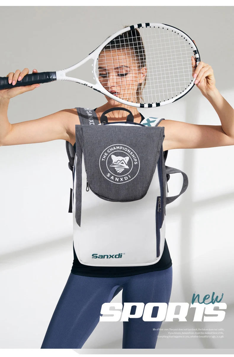 Woman holding squash racket with Sanxdi large capacity squash and badminton backpack, excellent quality and free delivery.