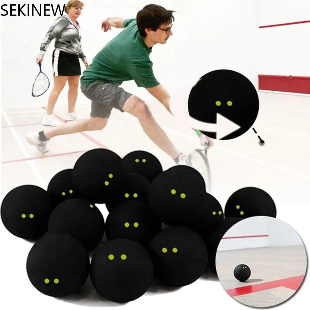 Professional squash balls for training and competition shown on a squash court.